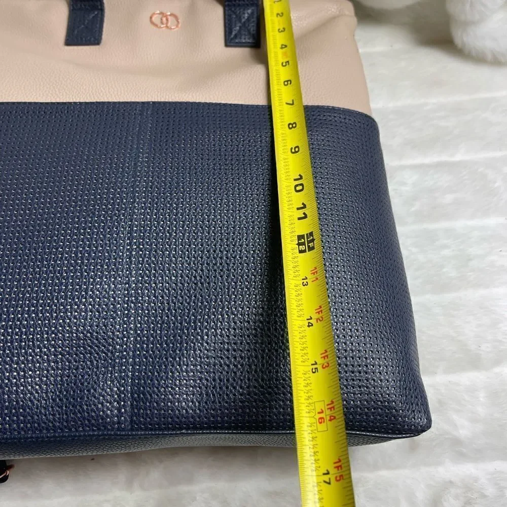 Caboodle Navy blue and beige computer backpack with rose gold hardwares